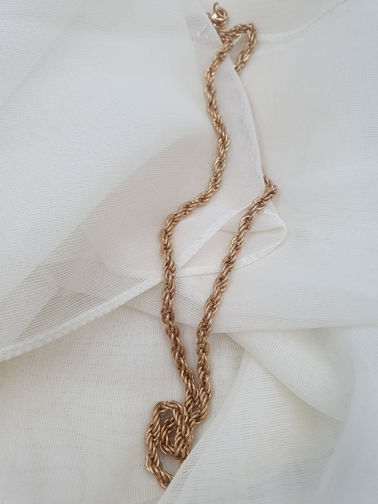 Close up image, gold twist rope chain